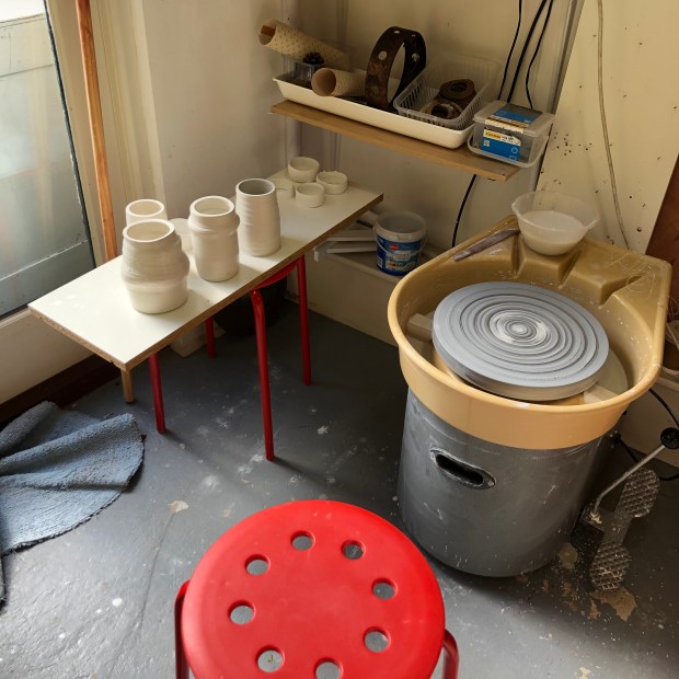 Throwing work in progress at wheel (Totem)